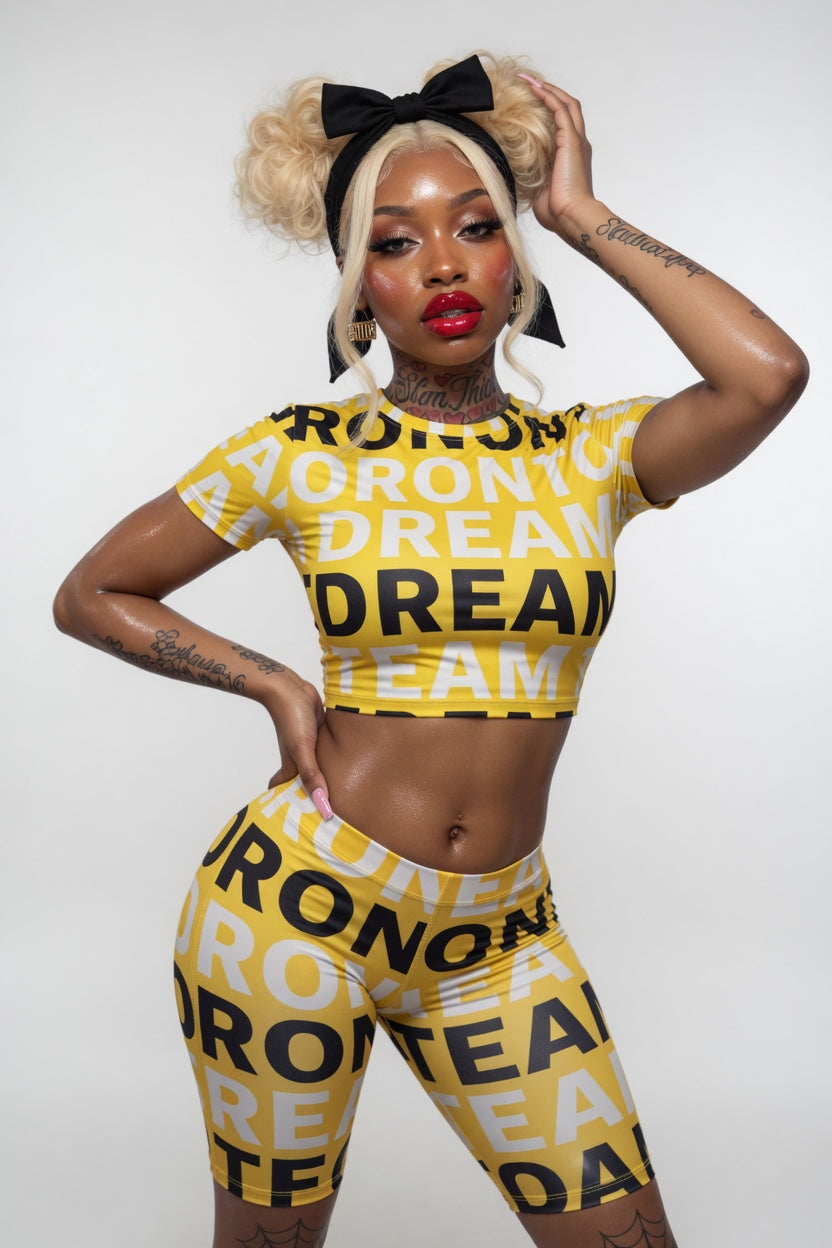 Women's Biker Shorts — Bold Repeat 'REANT' Graphic Yellow Print